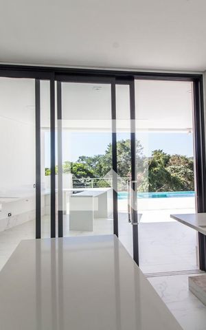 Casa de condomínio à venda com 540m², 4 quartos e 4 vagas Casa de condomínio à venda com 540m², 4 quartos e 4 vagasCozinha