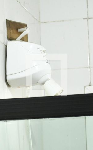 Casa de condomínio para alugar com 430m², 4 quartos e 3 vagasBanheiro da suíte 2 