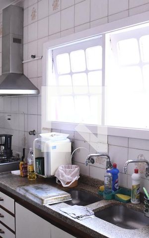 Casa de condomínio para alugar com 430m², 4 quartos e 3 vagasCozinha