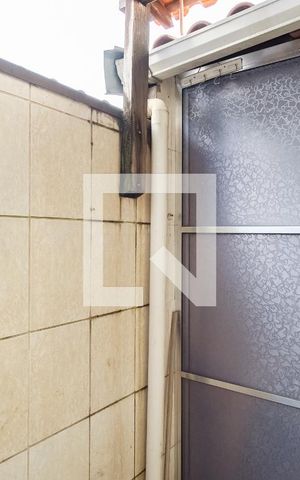 Casa de condomínio à venda com 60m², 2 quartos e 1 vagaQuintal