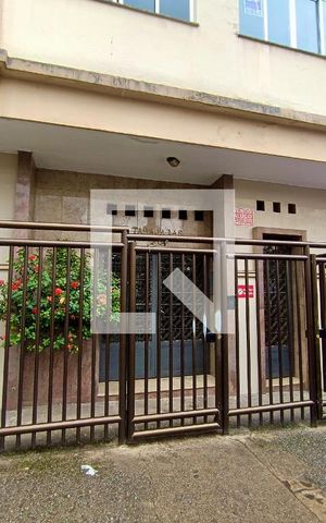 Apartamento à venda com 90m², 3 quartos e sem vagaFachada com cartaz QA