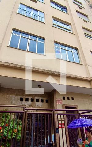 Apartamento à venda com 90m², 3 quartos e sem vagaFachada com cartaz QA