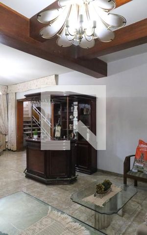 Casa de condomínio à venda com 549m², 9 quartos e 3 vagasSala