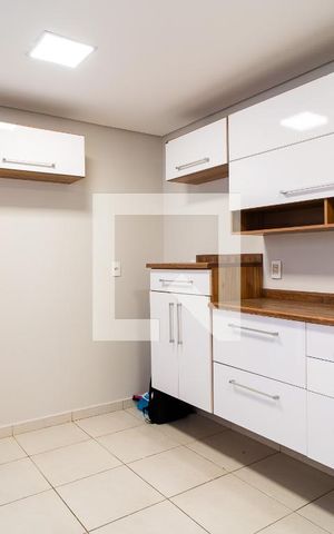 Casa de condomínio para alugar com 136m², 3 quartos e 2 vagasCozinha