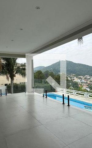 Casa de condomínio à venda com 1250m², 6 quartos e 5 vagasVaranda da Sala