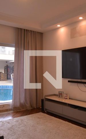 Casa à venda com 411m², 4 quartos e 6 vagasSala