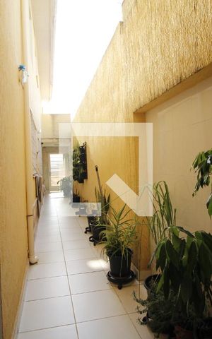 Casa à venda com 262m², 4 quartos e 3 vagasCorredor externo