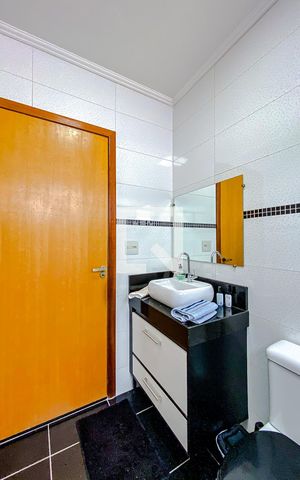 Casa à venda com 70m², 2 quartos e 2 vagasBanheiro da Suíte 2