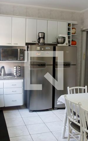 Casa à venda com 320m², 4 quartos e 2 vagas Casa à venda com 320m², 4 quartos e 2 vagasCozinha