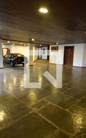 Casa à venda com 986m², 7 quartos e 10 vagasSalão / Garagem