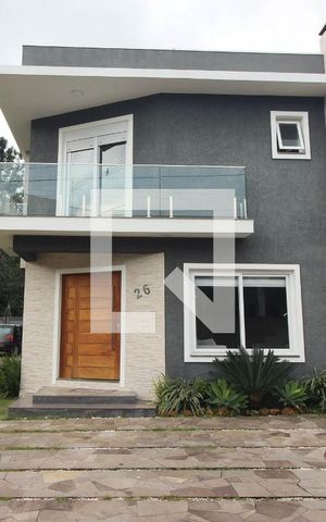 Casa de condomínio à venda com 180m², 3 quartos e 2 vagas Casa de condomínio à venda com 180m², 3 quartos e 2 vagasFachada