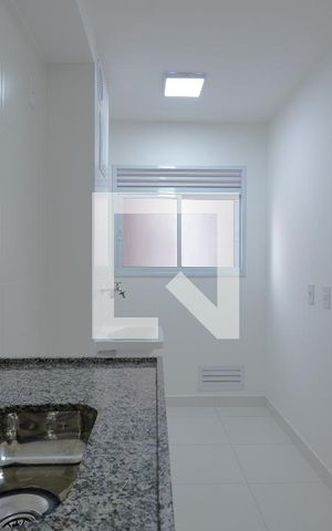 Apartamento à venda com 48m², 2 quartos e 1 vaga Apartamento à venda com 48m², 2 quartos e 1 vagaCozinha e Área de Serviço