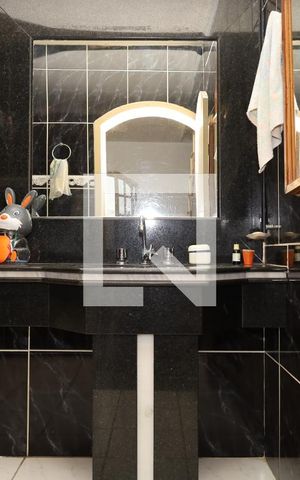 Casa à venda com 440m², 4 quartos e 4 vagasBanheiro