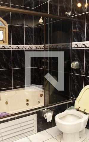 Casa à venda com 440m², 4 quartos e 4 vagasBanheiro