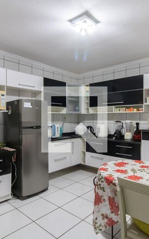 Casa à venda com 125m², 2 quartos e 2 vagas Casa à venda com 125m², 2 quartos e 2 vagasCozinha