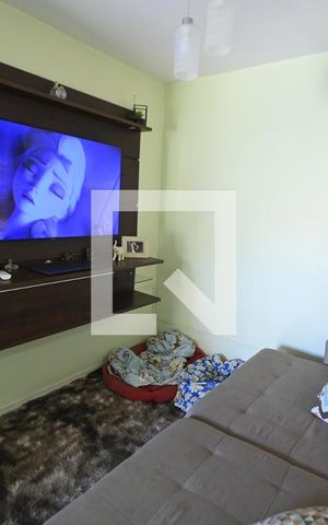 Casa de condomínio à venda com 55m², 2 quartos e 2 vagasSala