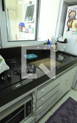 Casa de condomínio à venda com 55m², 2 quartos e 2 vagasCozinha