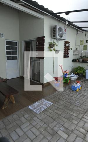 Casa de condomínio à venda com 55m², 2 quartos e 2 vagasChurrasqueira