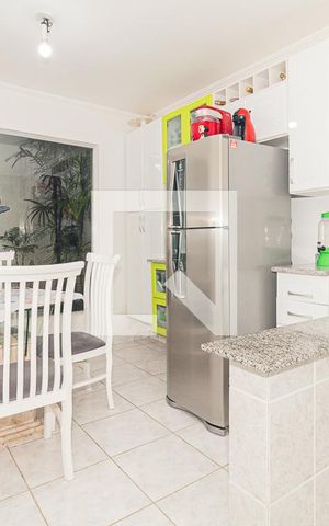 Casa à venda com 98m², 3 quartos e 2 vagas Casa à venda com 98m², 3 quartos e 2 vagasCozinha
