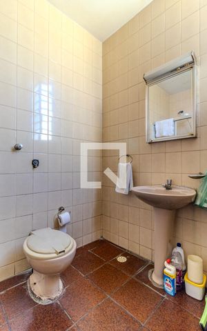 Casa à venda com 304m², 7 quartos e 4 vagasBanheiro da Suíte 1