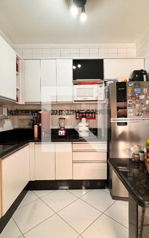 Casa à venda com 140m², 3 quartos e 2 vagas Casa à venda com 140m², 3 quartos e 2 vagasCozinha