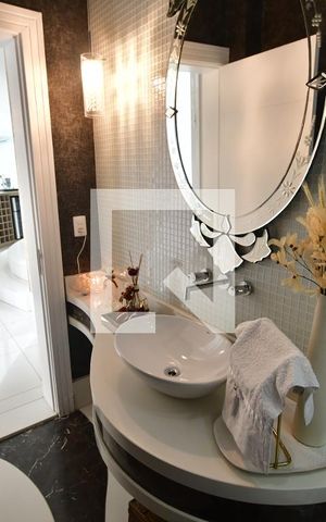 Casa de condomínio à venda com 311m², 4 quartos e 4 vagasLavabo