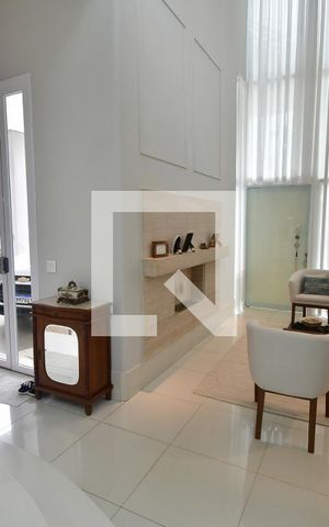 Casa de condomínio à venda com 311m², 4 quartos e 4 vagasSala 1