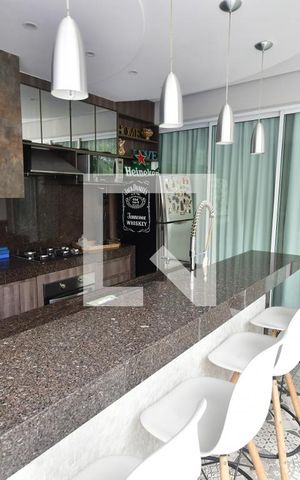 Casa de condomínio à venda com 311m², 4 quartos e 4 vagasChurrasqueira
