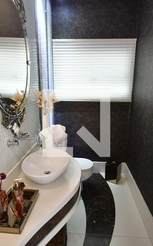 Casa de condomínio à venda com 311m², 4 quartos e 4 vagasLavabo
