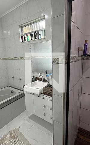 Casa para alugar com 400m², 3 quartos e 5 vagasBanheiro da Suíte 1
