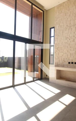 Casa de condomínio à venda com 494m², 4 quartos e 6 vagasSala