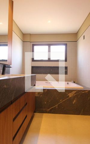 Casa de condomínio à venda com 494m², 4 quartos e 6 vagasBanheiro 5