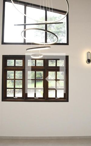 Casa de condomínio para alugar com 285m², 6 quartos e 4 vagasSala
