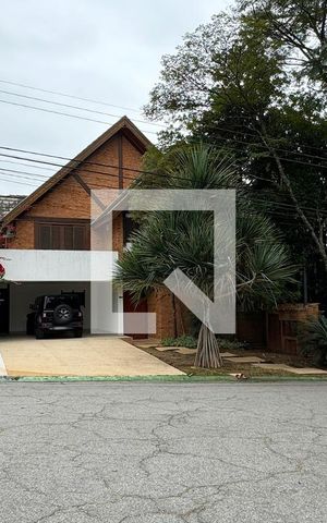 Casa de condomínio para alugar com 450m², 4 quartos e 6 vagasGaragem