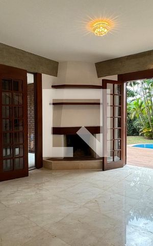 Casa de condomínio para alugar com 450m², 4 quartos e 6 vagasSala