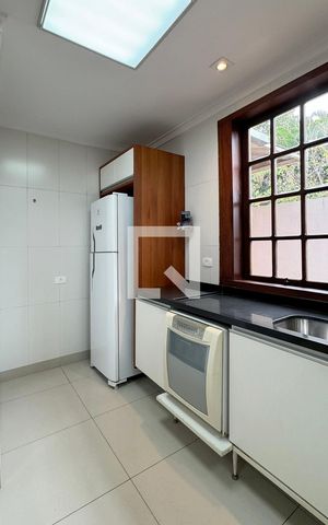Casa de condomínio para alugar com 450m², 4 quartos e 6 vagasCozinha