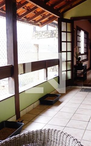 Casa de condomínio para alugar com 460m², 4 quartos e 2 vagasVaranda - Sala