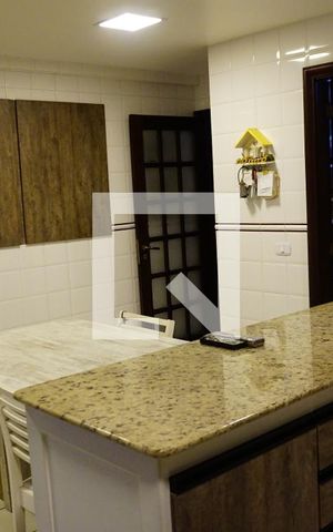 Casa de condomínio para alugar com 460m², 4 quartos e 2 vagasCozinha