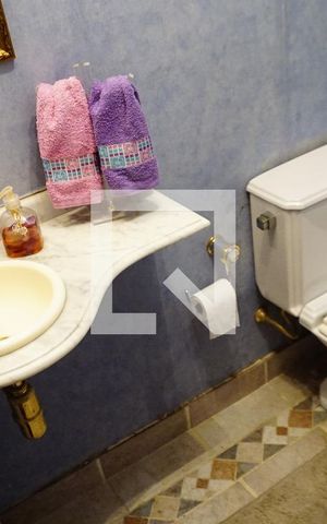 Casa de condomínio para alugar com 460m², 4 quartos e 2 vagasLavabo
