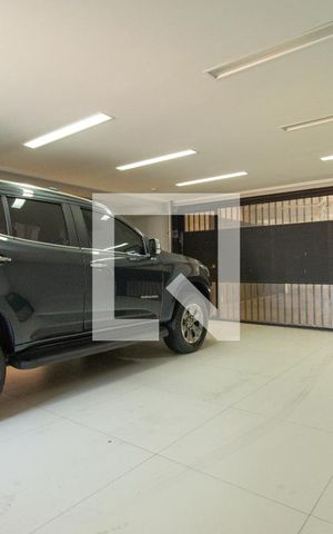 Casa de condomínio à venda com 464m², 4 quartos e 4 vagas Casa de condomínio à venda com 464m², 4 quartos e 4 vagasGaragem