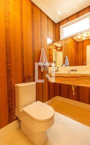 Casa de condomínio à venda com 464m², 4 quartos e 4 vagas Casa de condomínio à venda com 464m², 4 quartos e 4 vagasLavabo