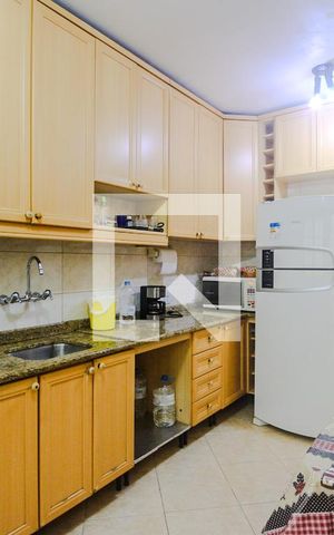 Casa à venda com 120m², 3 quartos e 2 vagas Casa à venda com 120m², 3 quartos e 2 vagasCozinha
