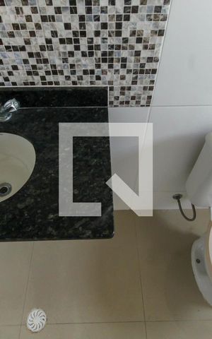 Casa de condomínio à venda com 40m², 2 quartos e 1 vaga Casa de condomínio à venda com 40m², 2 quartos e 1 vagaBanheiro do Quarto 1