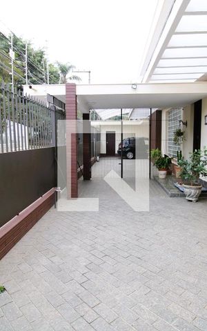 Casa à venda com 416m², 4 quartos e 4 vagasGaragem