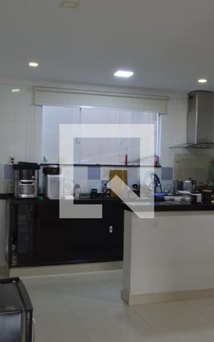 Casa de condomínio para alugar com 320m², 5 quartos e 2 vagasCozinha 