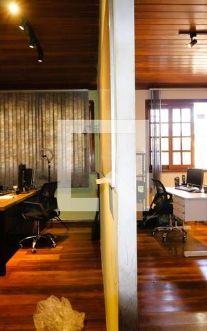 Casa à venda com 277m², 4 quartos e 8 vagasSala