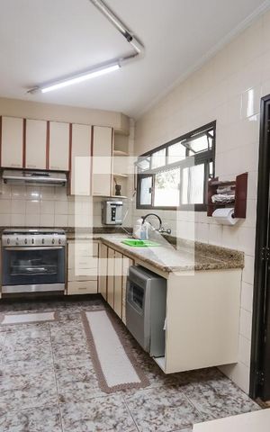 Casa de condomínio para alugar com 300m², 4 quartos e 5 vagasCozinha