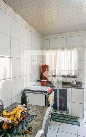 Casa à venda com 231m², 4 quartos e 4 vagas Casa à venda com 231m², 4 quartos e 4 vagasCozinha