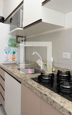 Apartamento à venda com 48m², 2 quartos e sem vaga Apartamento à venda com 48m², 2 quartos e sem vagaCozinha e Área de Serviço