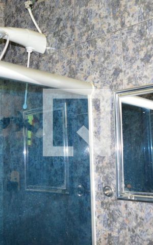 Casa à venda com 374m², 4 quartos e 10 vagasBanheiro da Suite 1